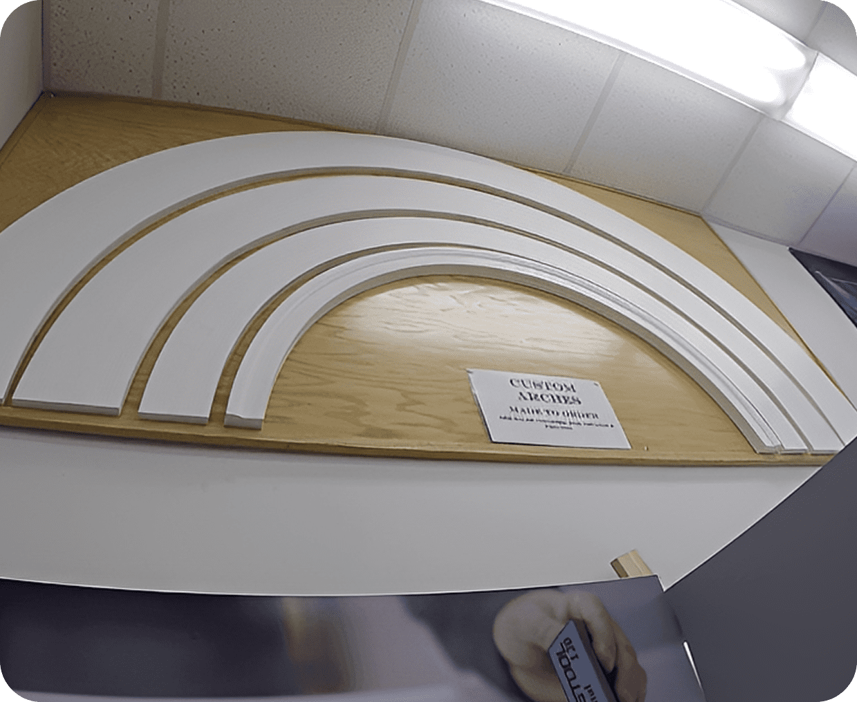 Curved architectural moldings on wall